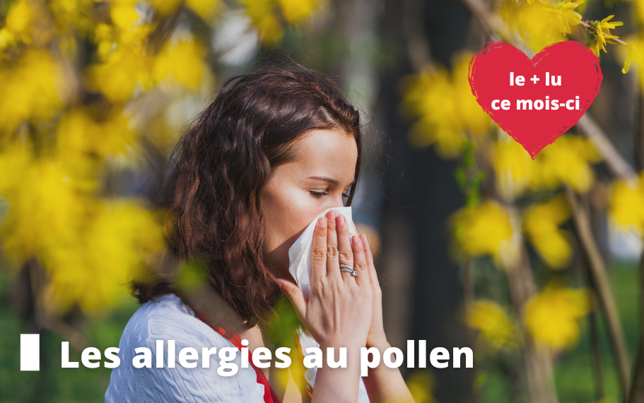 Femme dans un champs de fleurs qui se mouche le nez car elle est allergique au pollen